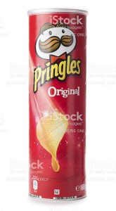St Ives, England - October 20, 2011: A tube of Pringles original potato chips isolated on white background. Pringles are produced by Procter & Gamble and sold in more than 140 countries.